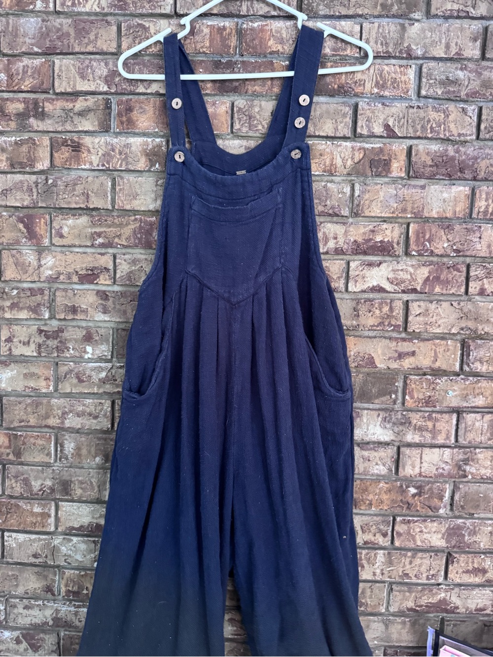 Free people 100% cotton faded black sun drenched baggy relaxed overalls.